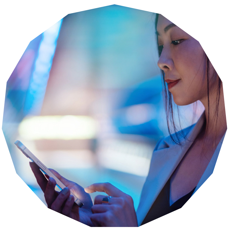 Close up of a woman working on a smartphone