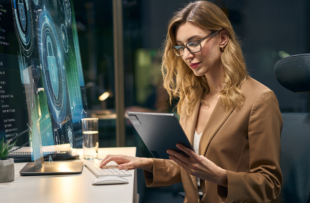 Woman working late on a laptop.
