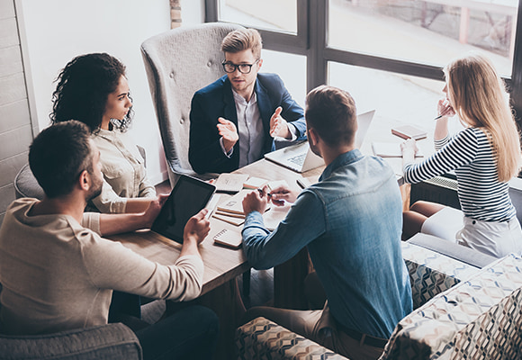 Young colleagues having a meeting in a modern office