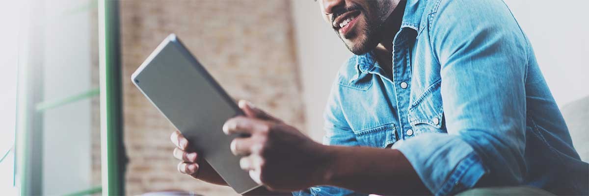 A man uses a secure tablet