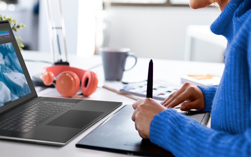 Woman working on graphic pad