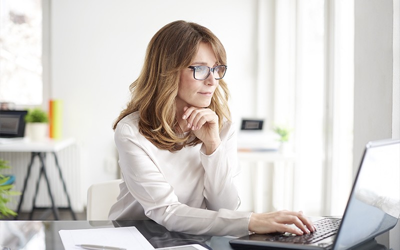 woman working remotely through the cloud